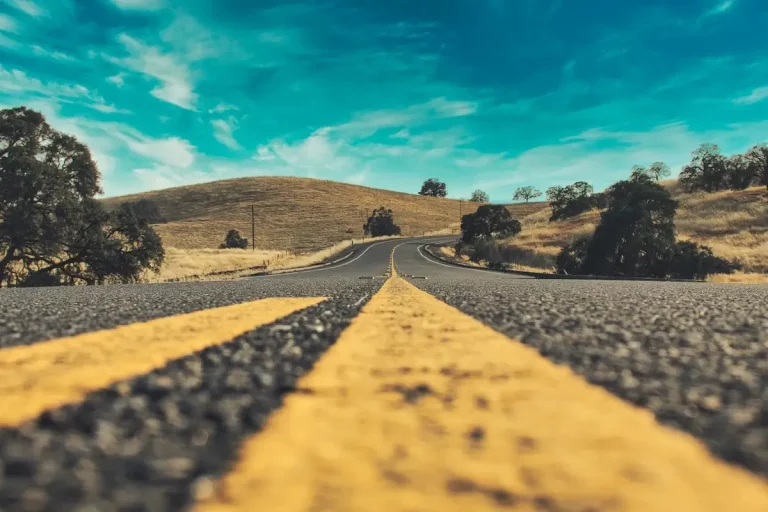 A long yellow stripe running down the central Yosemite highway