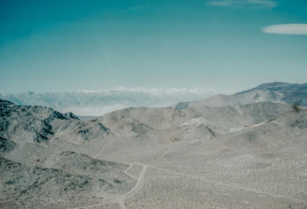 Aerial view of Owens Valley with snowcapped mountains in the background
