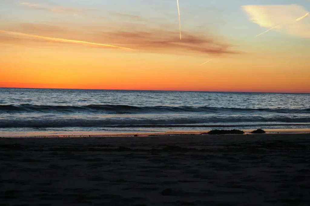 Soft orange sunset over the beach of Carpenteria