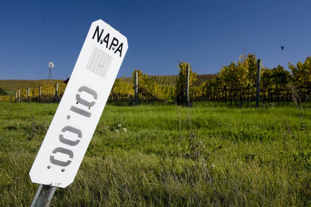 Grape vines behind a Napa mile marker