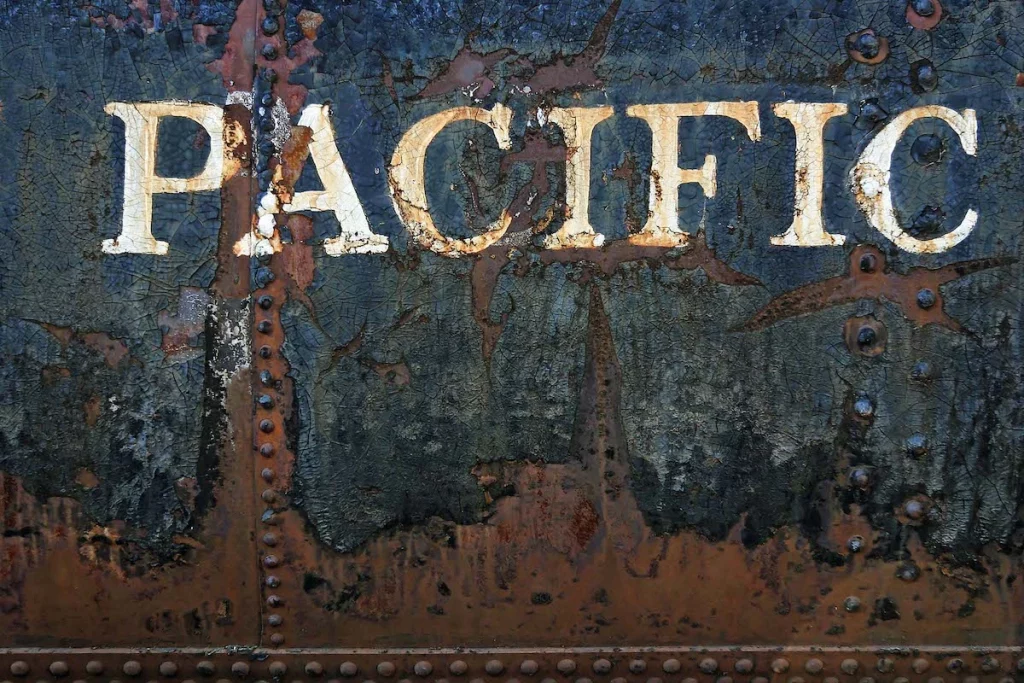 Pacific painted on the side of an old railway tanker